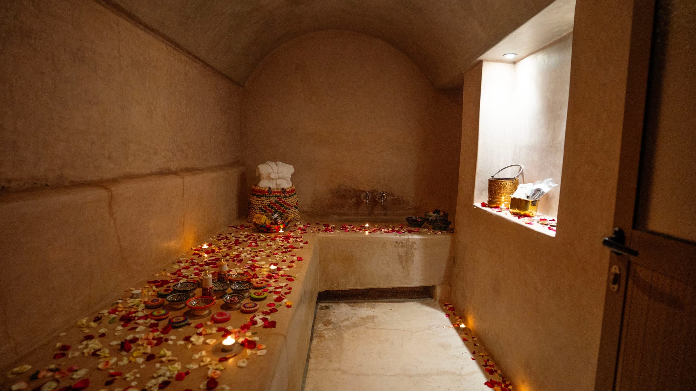 The chamber strewn with rose petals